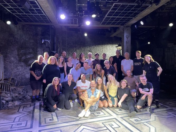 Full cast onstage after warm ups