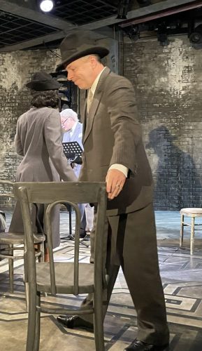 In rehearsal moving furniture, yet again for Sir Trev